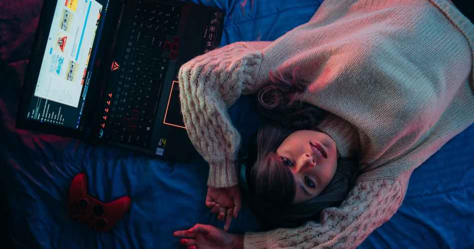 teenage girl lying on bed
